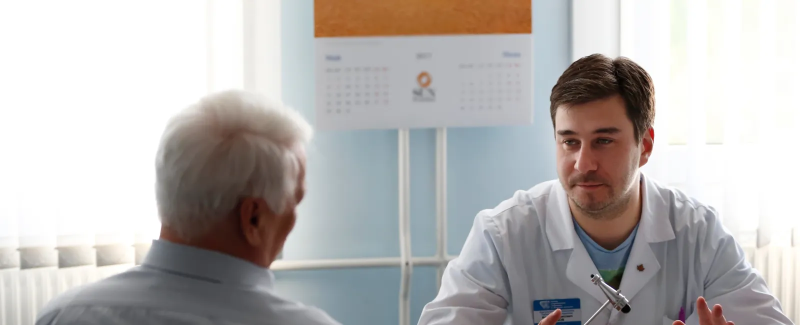 a doctor talking to a patient