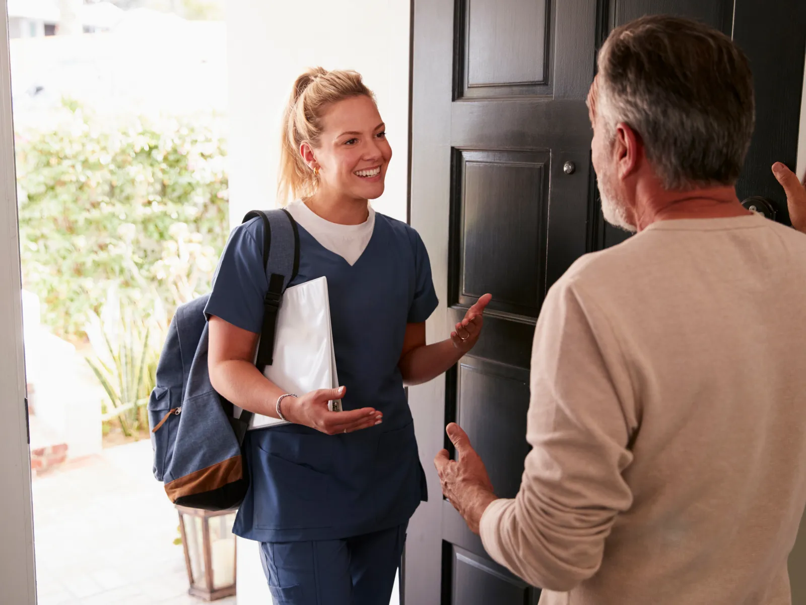 A woman talking to a man
