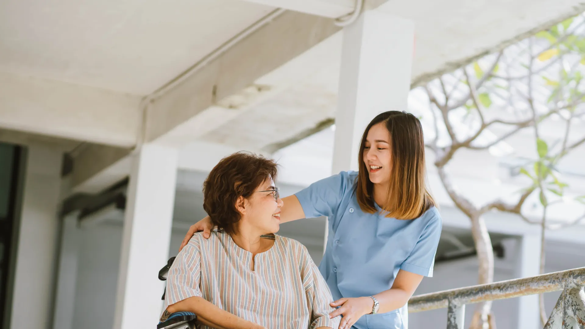 a woman and a man on a bicycle