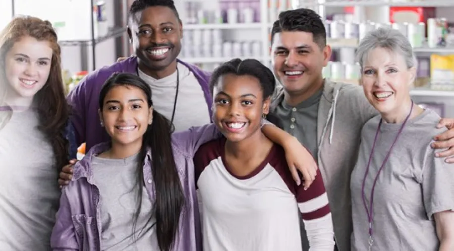 a group of people posing for a photo