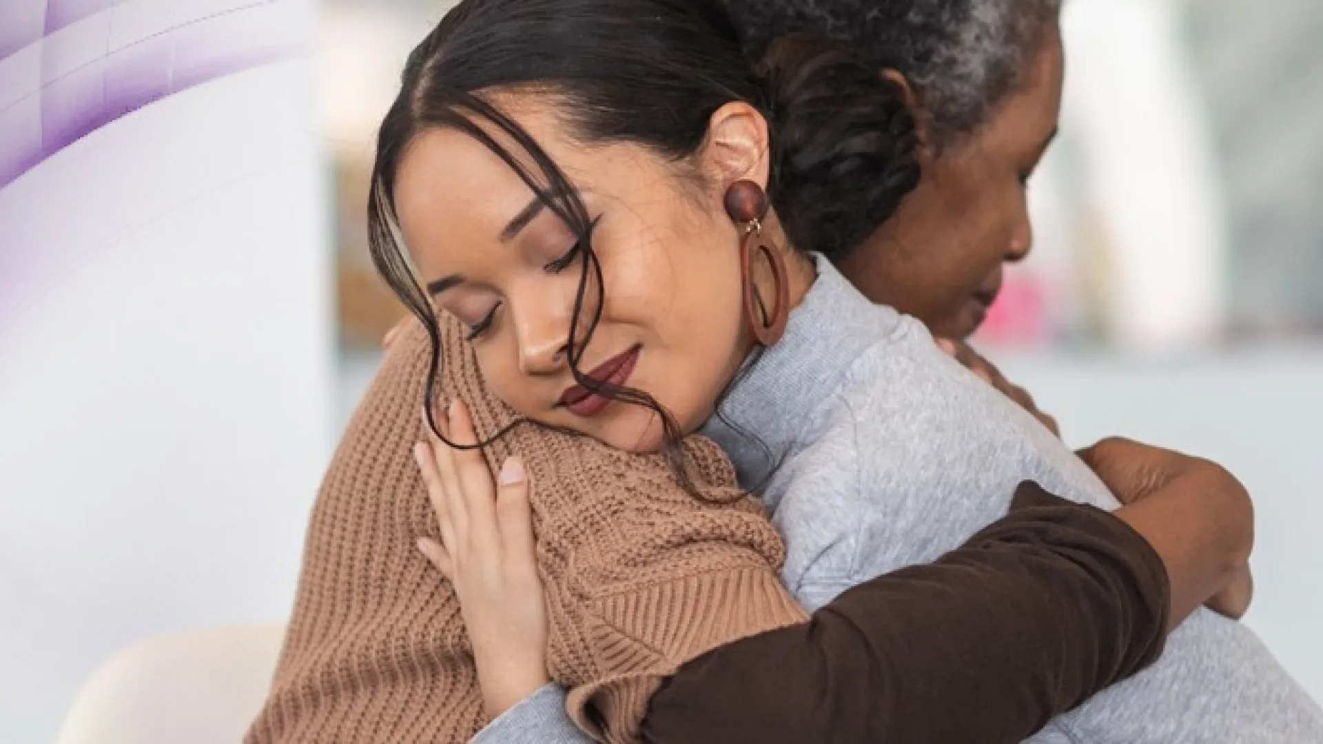 a person holding a baby