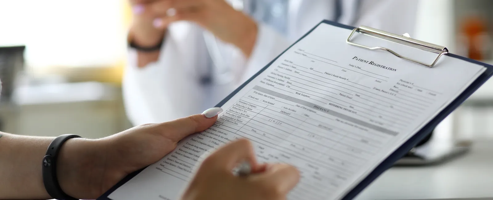 a few people reading a book