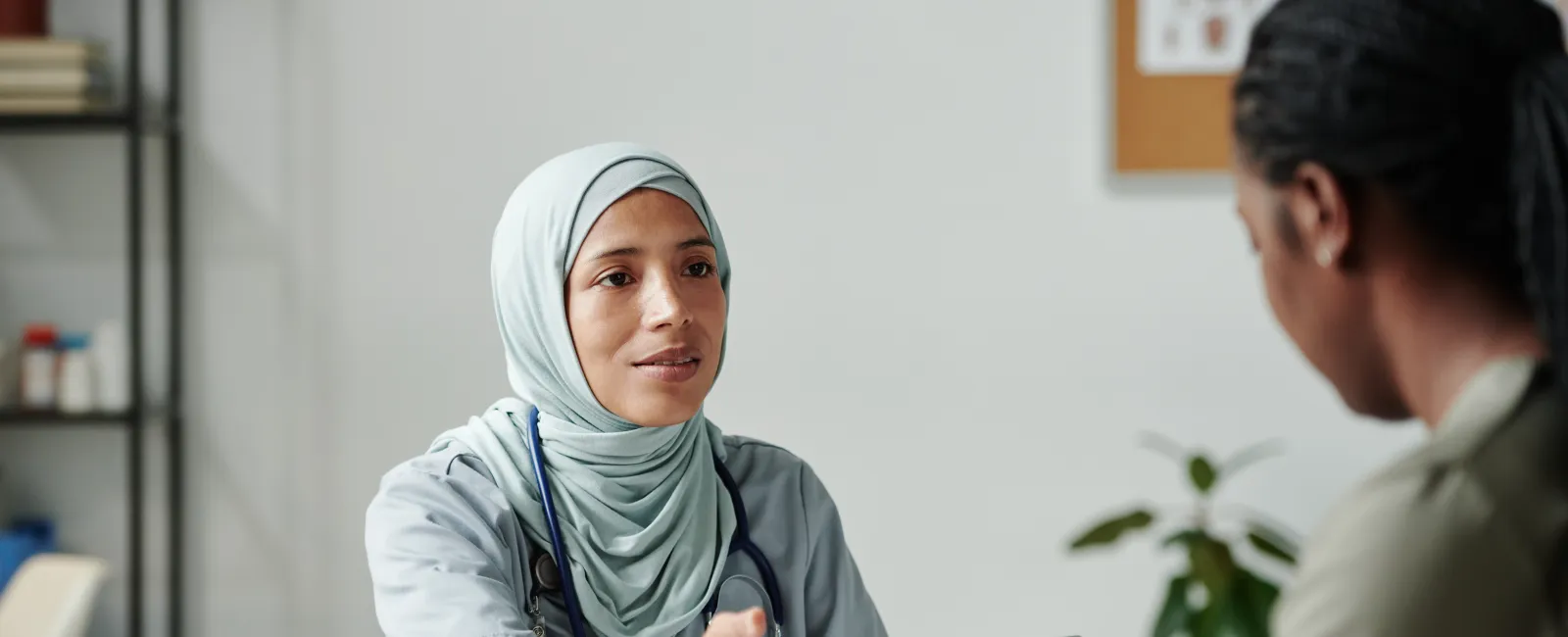 a doctor talking to a patient