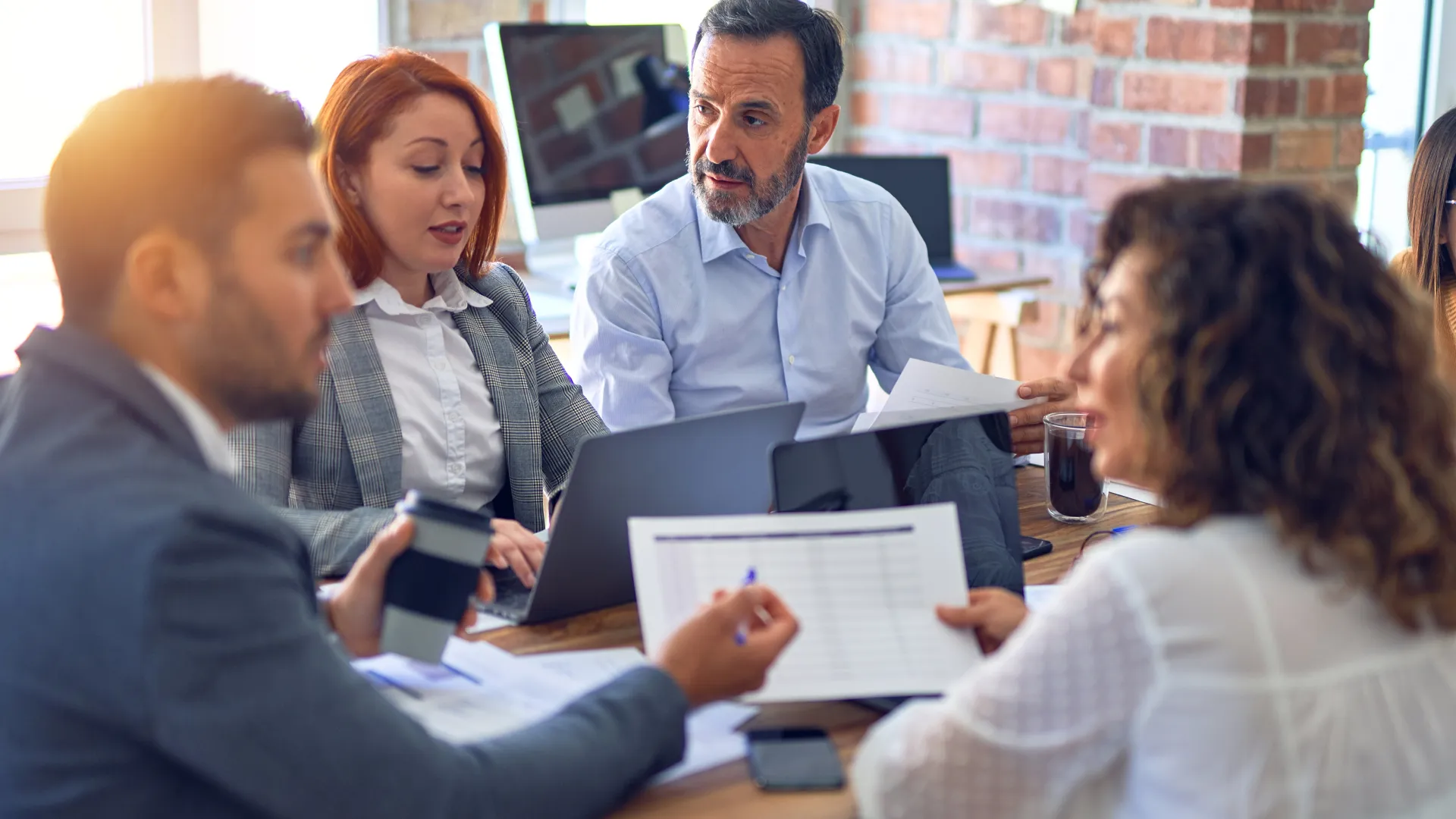 a group of people sitting in a room