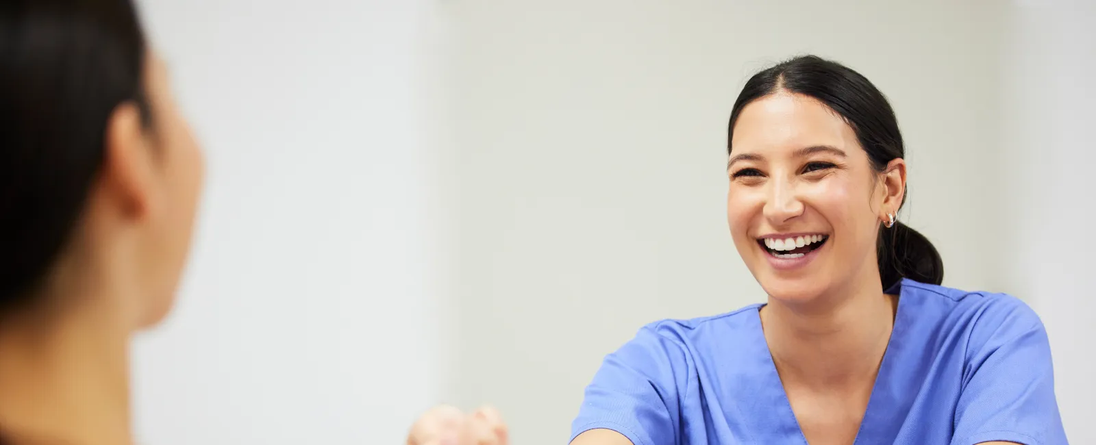 a woman holding a piece of paper