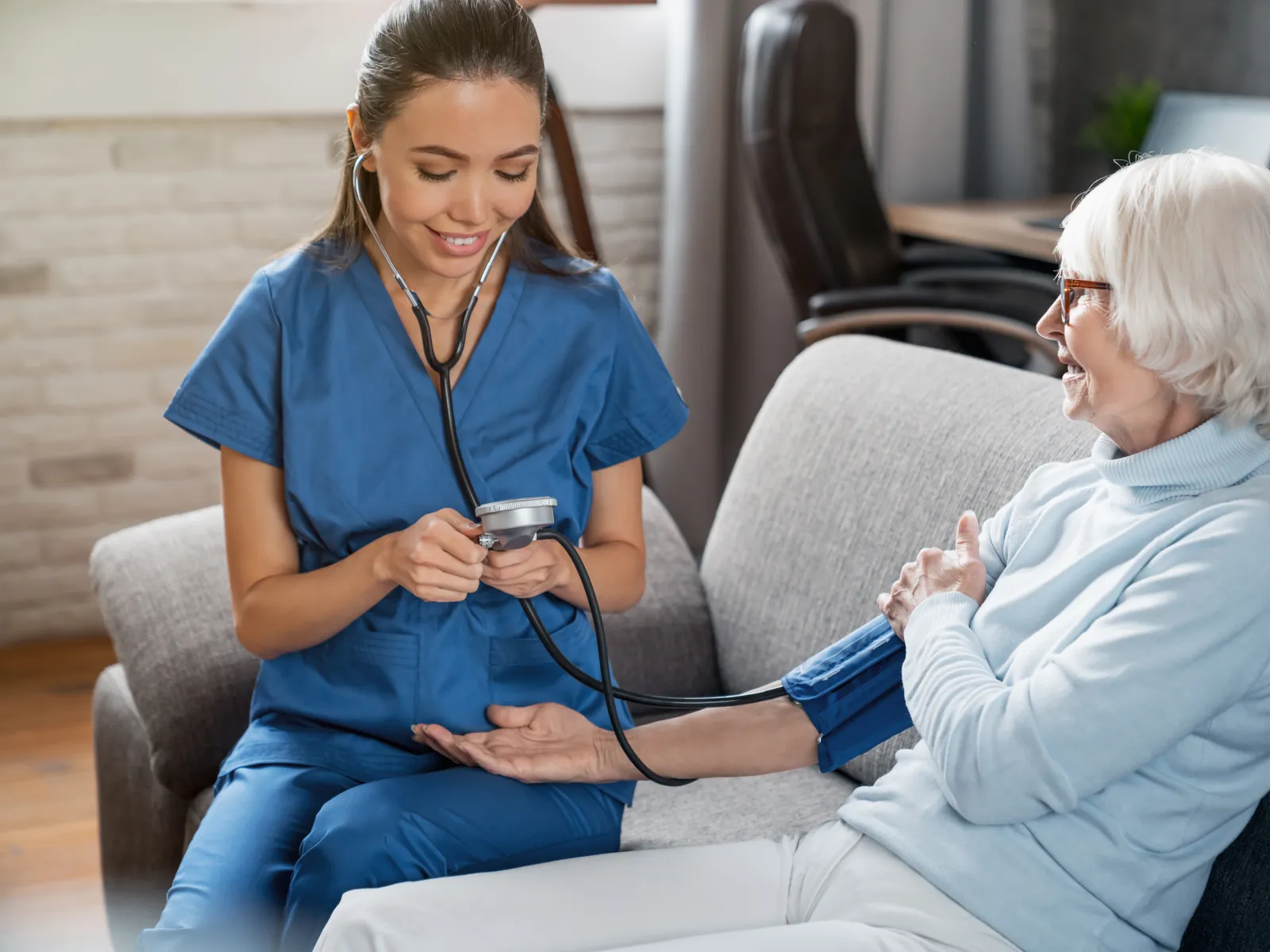 a doctor showing a patient something on the phone