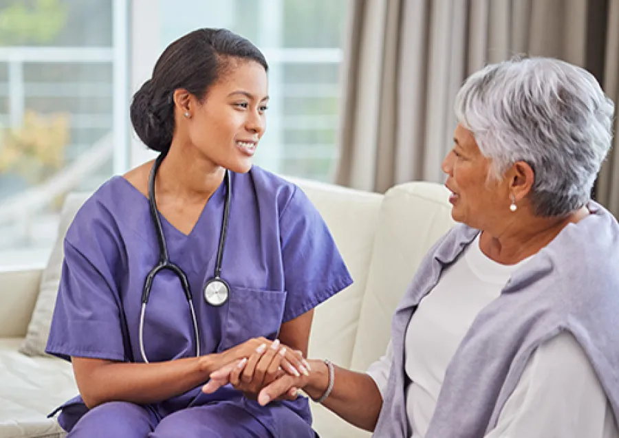 a woman and an old woman sitting