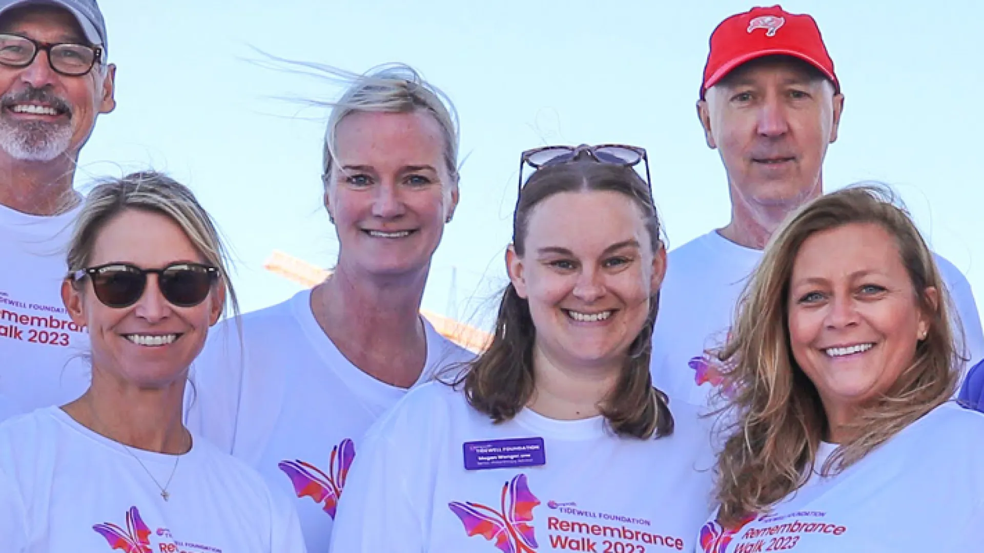 a group of people posing for a photo
