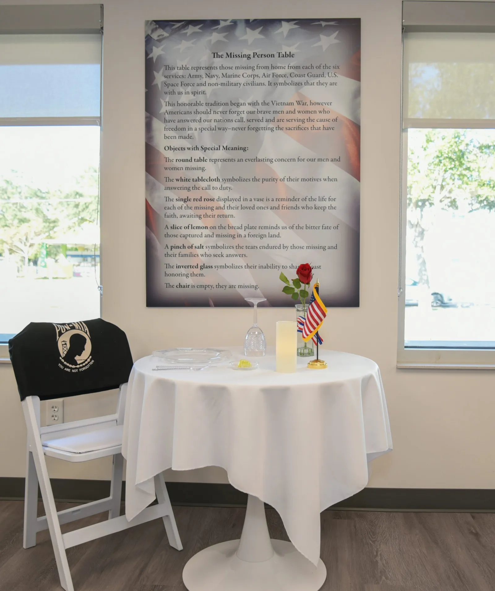 a table with a flag and chairs