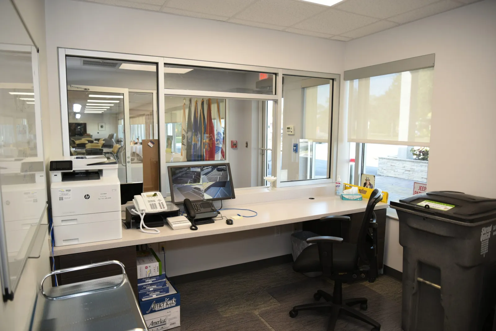 an office with a desk and computer
