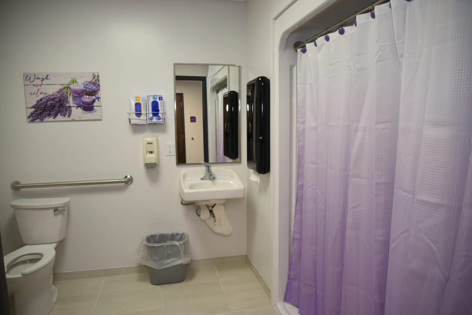 a bathroom with a shower curtain