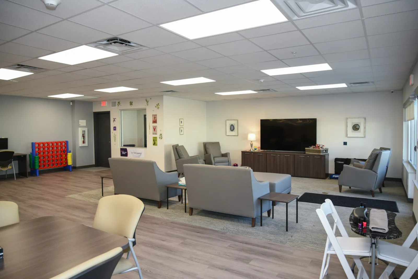 a room with chairs and tables