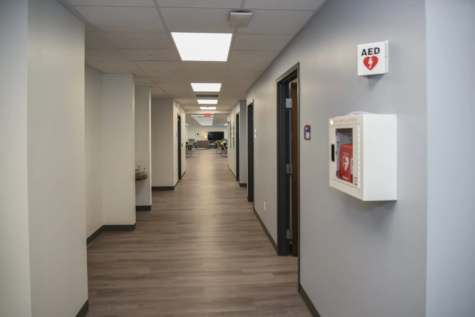 a long hallway with white walls