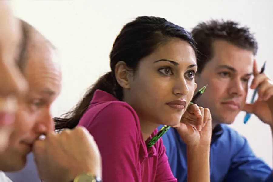 a person holding a pen