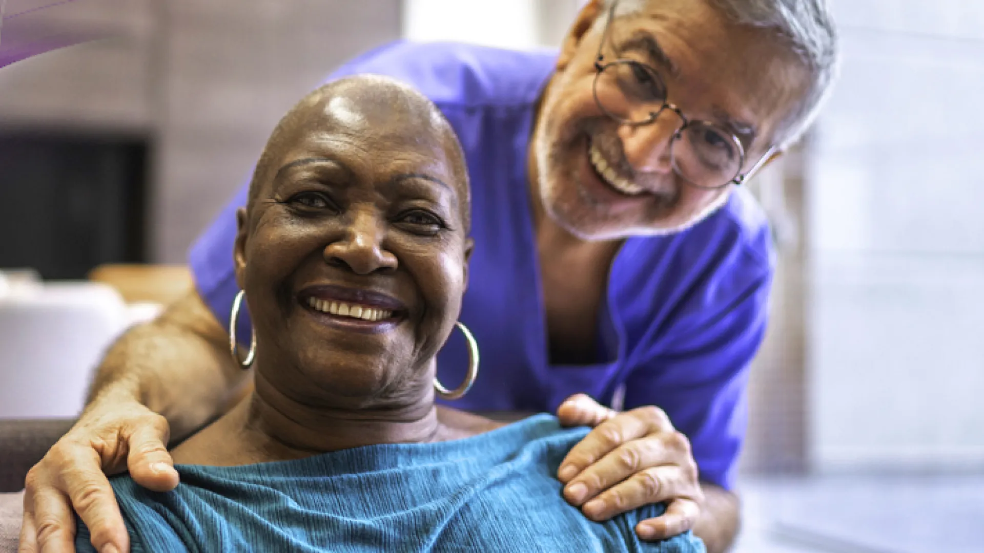 a woman and a man smiling