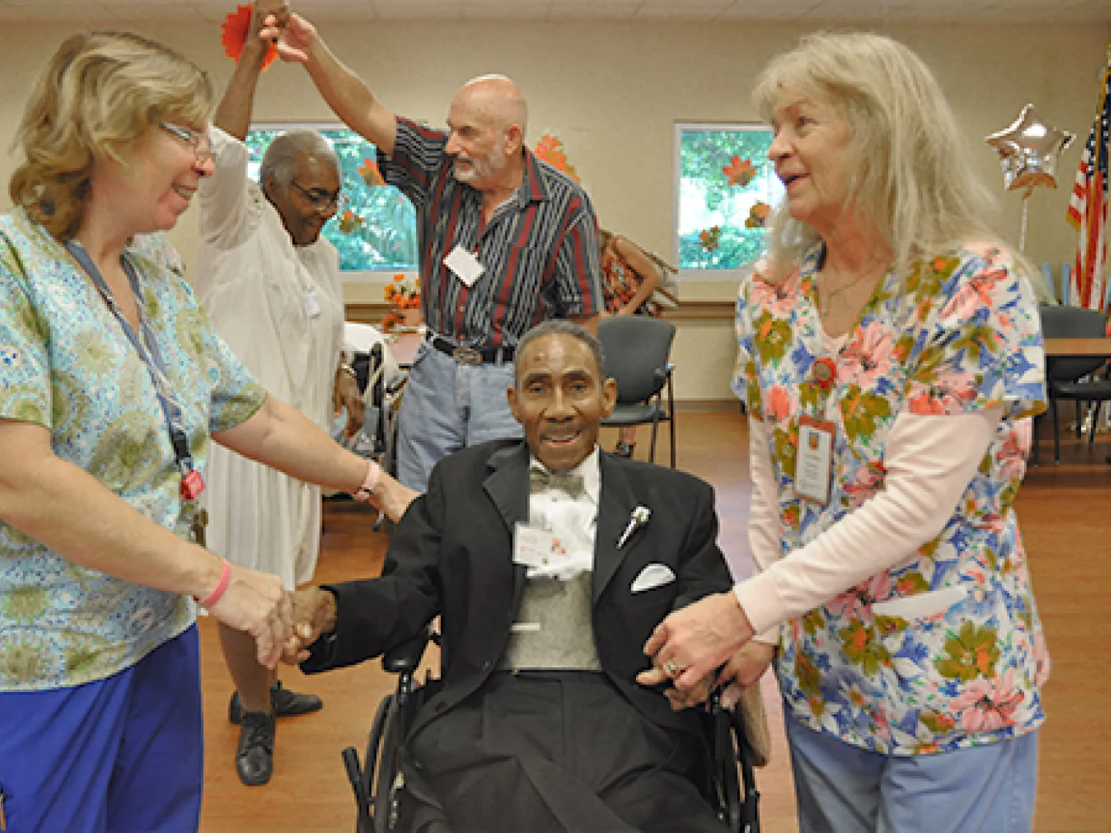 a group of people shaking hands