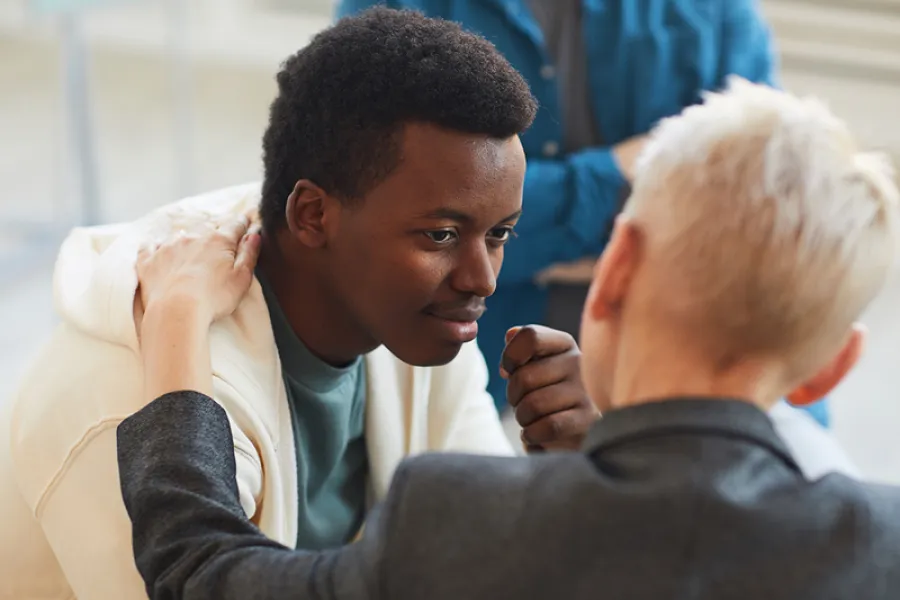 a man and a woman looking at each other